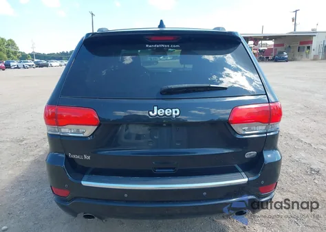 2014 Jeep Grand Cherokee Overland из США, поврежденный, VIN 1C4RJECG4EC410218
